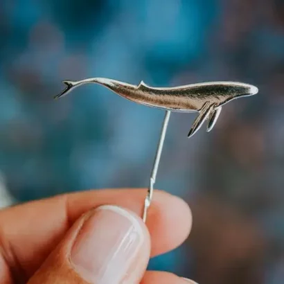 Blue Whale Pin, handmade with Sustainable Silver, Hand Shot