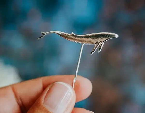 Blue Whale Pin, handmade with Sustainable Silver, Hand Shot