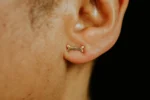 Bone Stud, handmade with Sustainable Gold, Model Shot 2