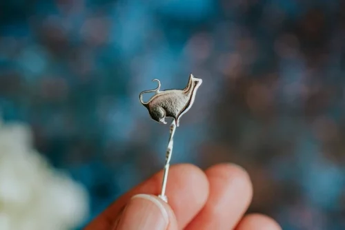 Sitting Silver Cat Pin, handmade with Sustainable Silver, Hand Shot