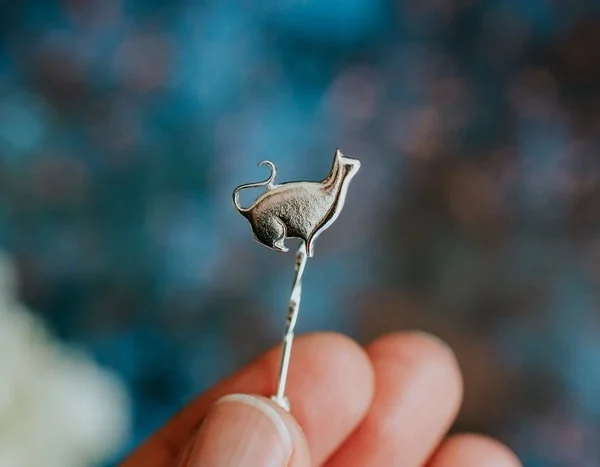 Sitting Silver Cat Pin, handmade with Sustainable Silver, Hand Shot