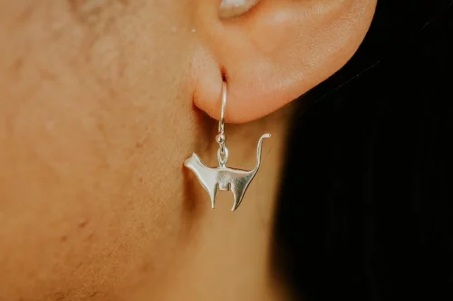 Standing Silver Cat Earrings, handmade with Sustainable Silver, Model Shot
