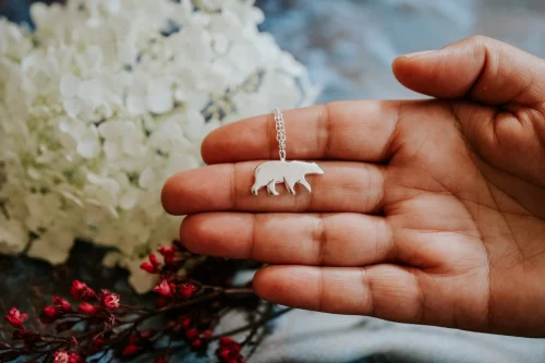 Polar Bear Necklace, handmade with Sustainable Silver, Hand Shot
