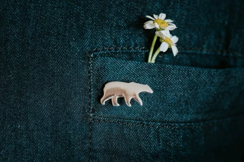 Polar Bear Pin, handmade with Sustainable Silver, Model Shot