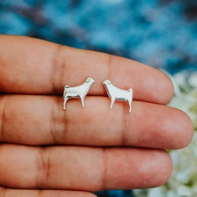 Pug Dog Studs, handmade with Sustainable Silver, Hand Shot