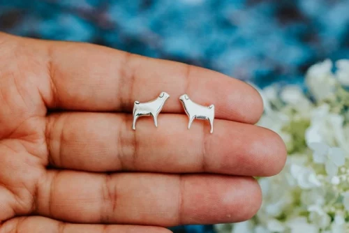 Pug Dog Studs, handmade with Sustainable Silver, Hand Shot