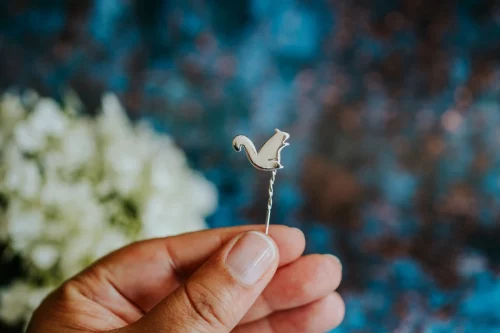 Squirrel Pin, handmade with Sustainable Silver, Hand Shot