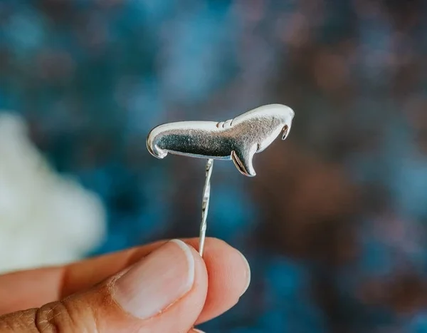Walrus Pin, handmade with Sustainable Silver, Hand Shot