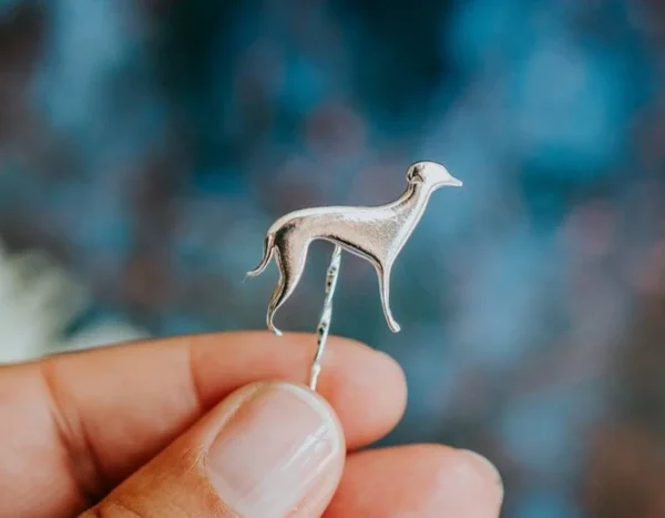 Whippet Dog Pin, handmade with Sustainable Silver, Hand Shot