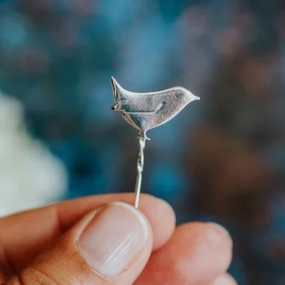 Wren Pin, handmade with Sustainable Silver, Hand Shot