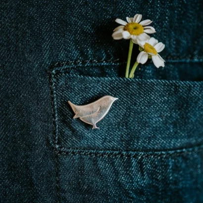 Wren Pin, handmade with Sustainable Silver, Model Shot