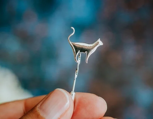 Standing Cat Pin, handmade with Sustainable Silver, Hand Shot