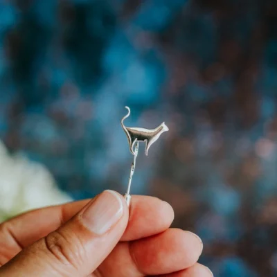 Standing Cat Pin, handmade with Sustainable Silver, Hand Shot Zoom