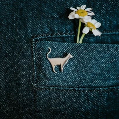 Standing Cat Pin, handmade with Sustainable Silver, Model Shot