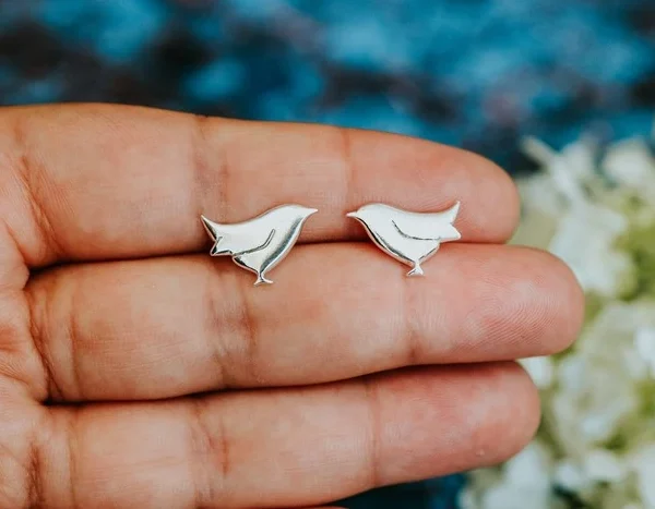 Wren Stud Earrings, handmade with Sustainable Silver, Hand Shot