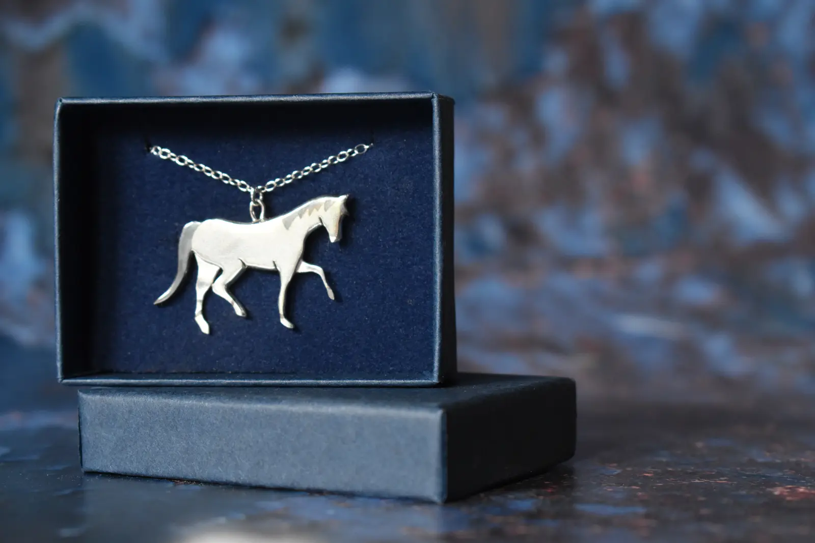 Bespoke pony necklace pierced from 2 sheets of recycled silver, with oxidised detailing. Bespoke Commission of Silver Jewellery in Elousie Makes Jewellery Box