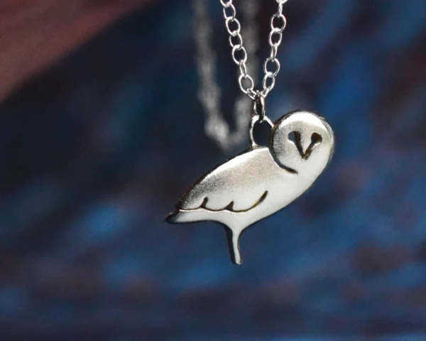 Handcrafted sterling silver owl necklace featuring a detailed owl pendant on an adjustable chain, ethically sourced and handmade in the UK. Designed and handmade by Elouise Makes Jewellery