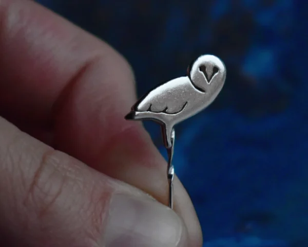 Handcrafted sterling silver owl pin featuring an intricately detailed owl design, ethically sourced and handmade in the UK. Designed and handmade by Elouise Makes Jewellery