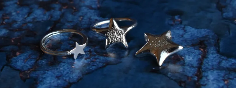 Claire’s starfish rings and pendant - Sandcasted from her own silver